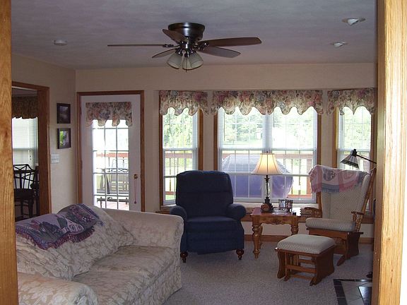 Den with gas/wood burning fireplace