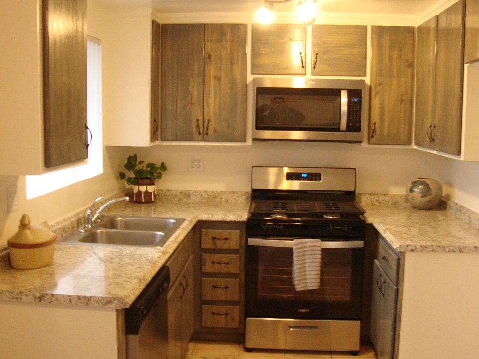 Brand new renovated kitchen with stainless steel appliances, custom cabinets, LED lighting