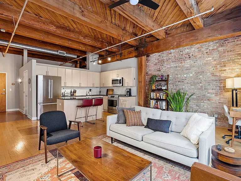 Open-concept living space with easy movement around the kitchen island