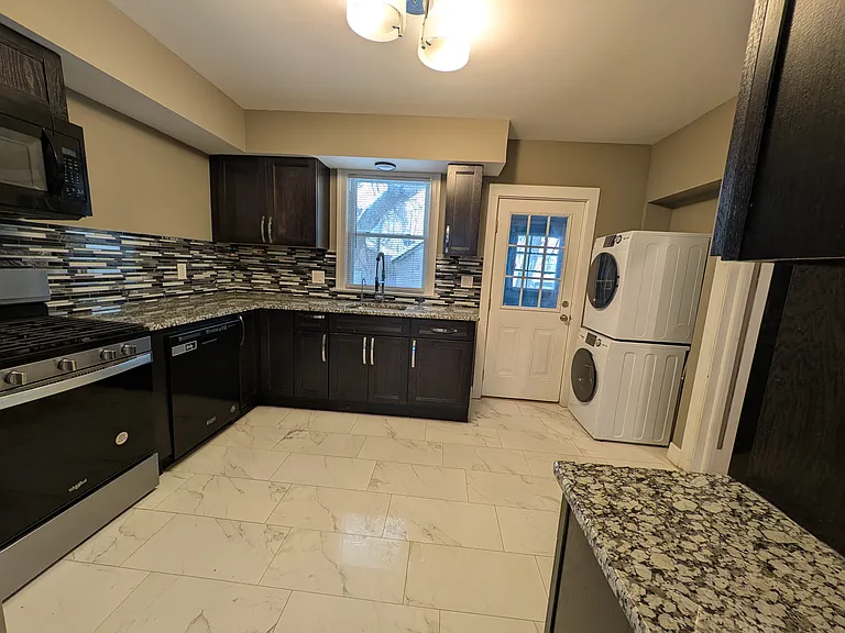 Fully appliance-d kitchen Gas Stove, Microwave with vent, Side by Side Fridge with Icemaker, Washer Dryer, and sink disposal and 5 stage osmosis water filtration
