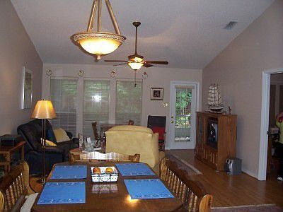 Open floor plan with cathedral ceiling