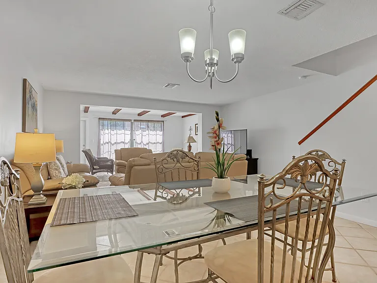 Dining area between kitchen and living room