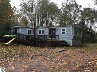 13905 Indian Rd, Kewadin, MI 49648