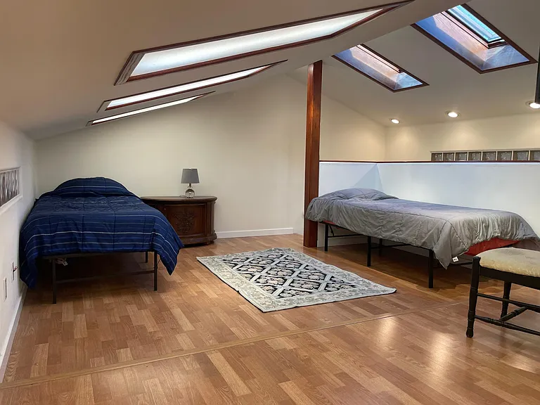 Loft with 2 twin beds. Could be used as an office or quiet area for work from home.