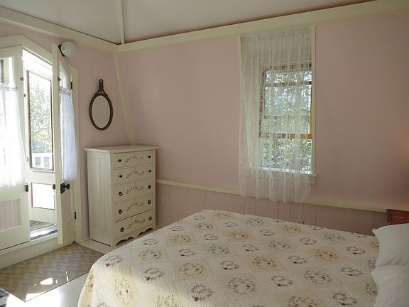 Front bedroom with balcony overlooking park