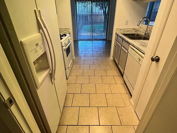 View of kitchen from laundry room