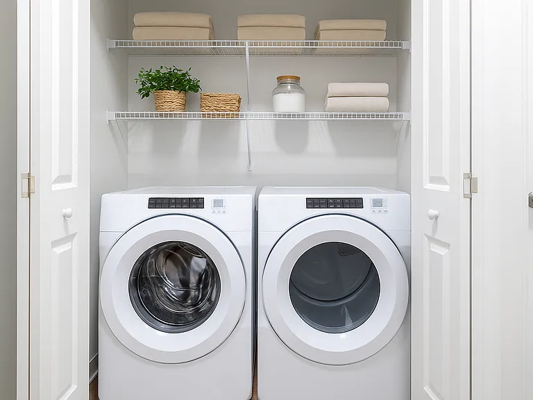 Top-of-the-line front-load washer and dryer units, this space offers high-efficiency performance and a sleek, built-in look.