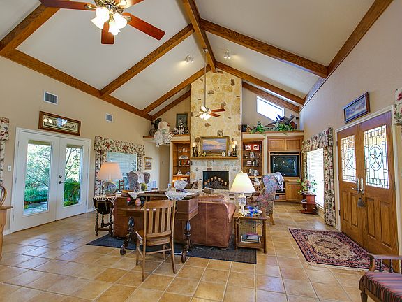 High ceiling & rock fireplac