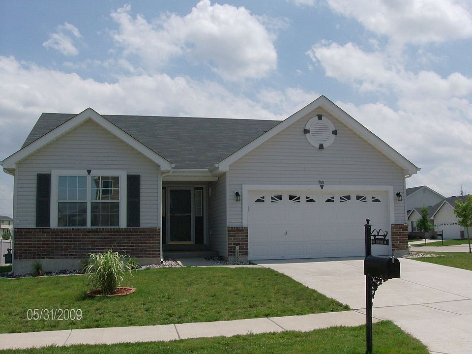 Brick and vinyl siding