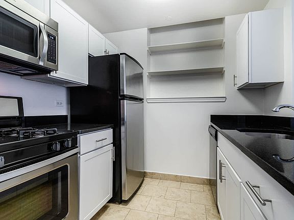 Kitchen with Granite Countertops and Stainless Steel Appliances
