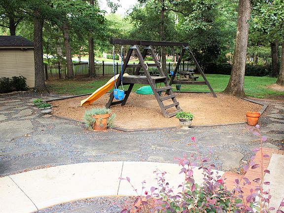 Playground and Power Supplied 12x20' Wooden Shed