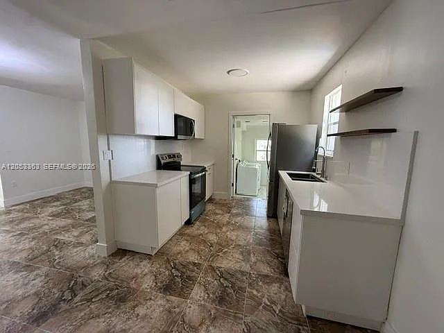 1121 NW 56th St — Photo 8