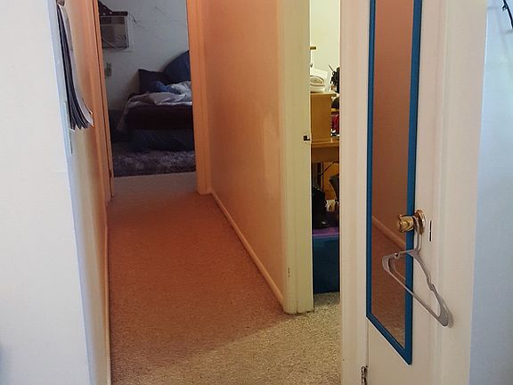 Hallway connects all rooms, and has a small closet