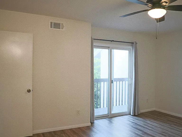 Primary Bedroom with en suite bathroom and balcony.