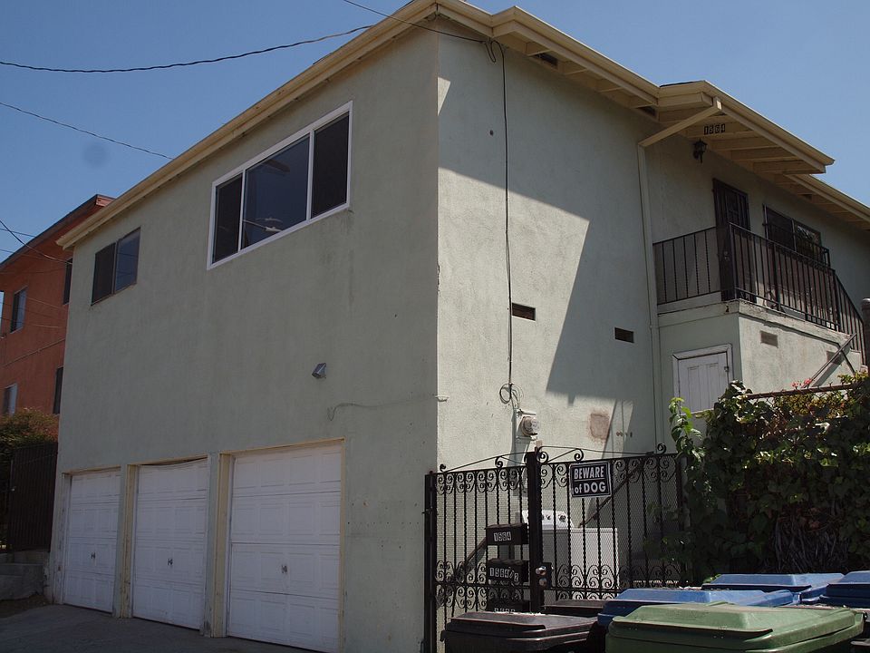 Front. Home sits over the garages