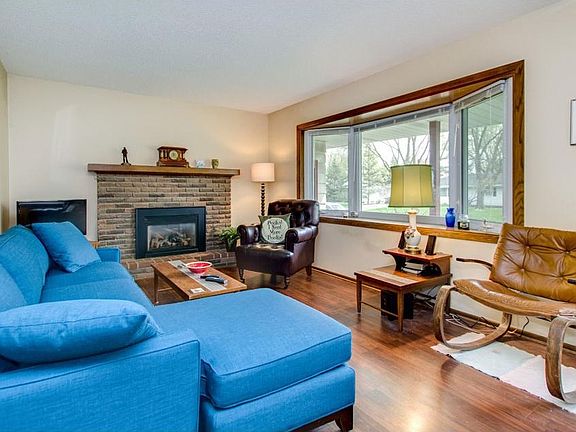 Brick fireplace with gas insert for instant heat!