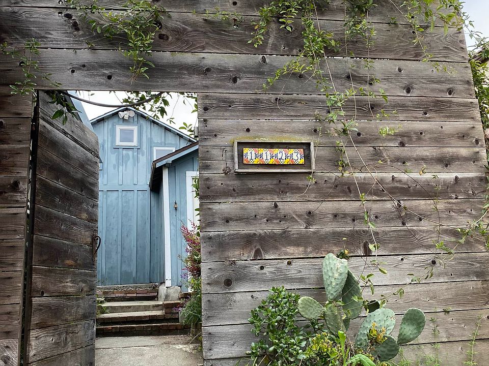 View through gate from parking space