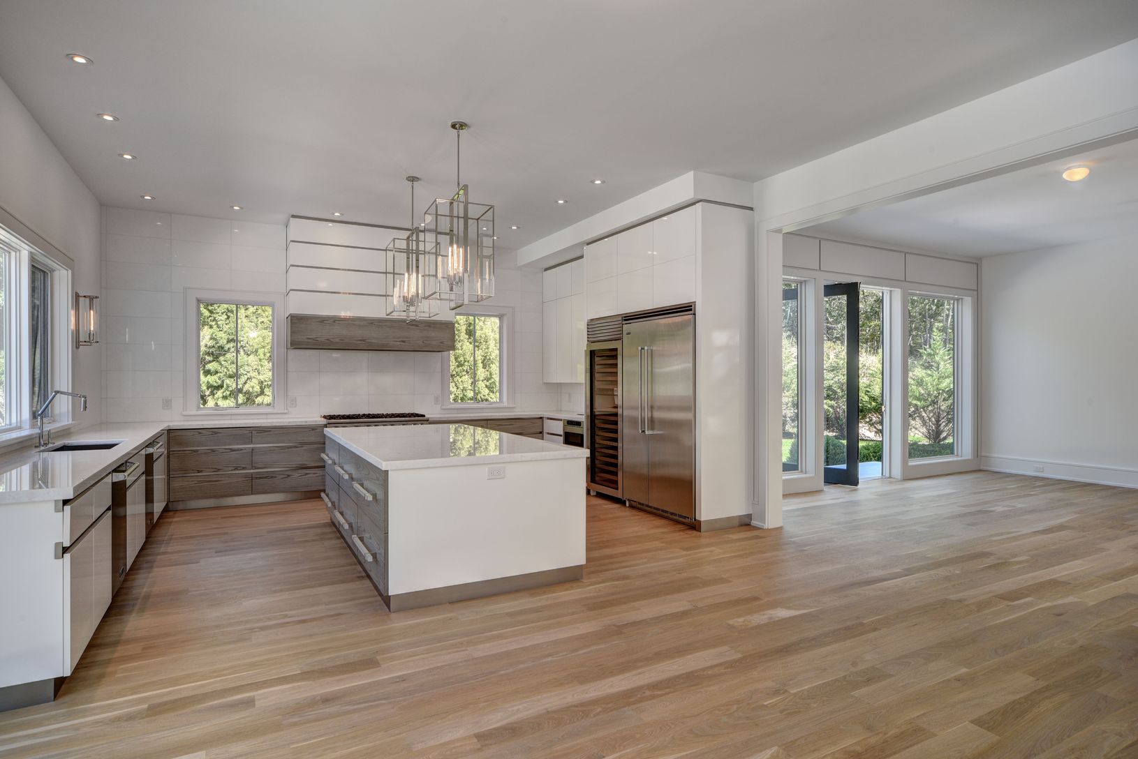  Kitchen Opens to Dining Room with Glass Wall