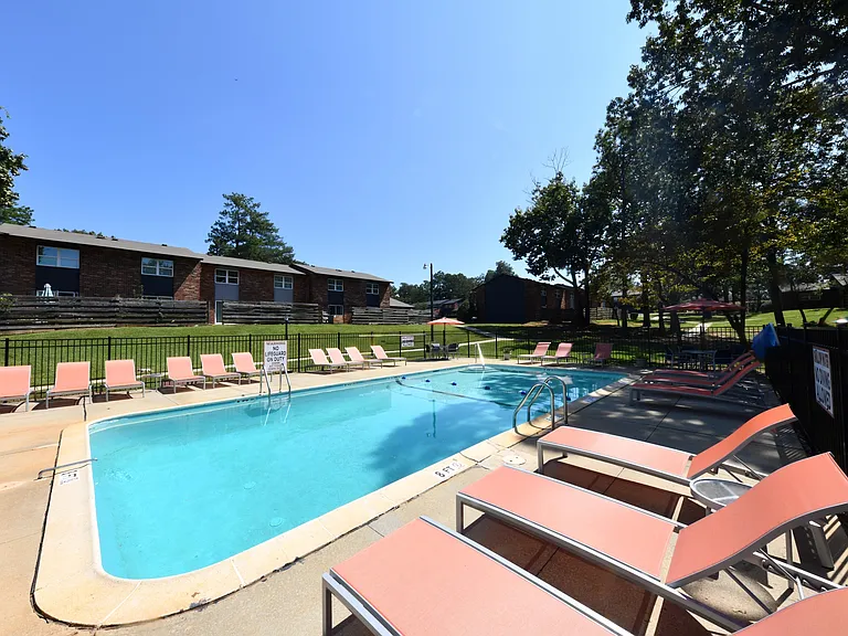 Pool area with lounge chairs
