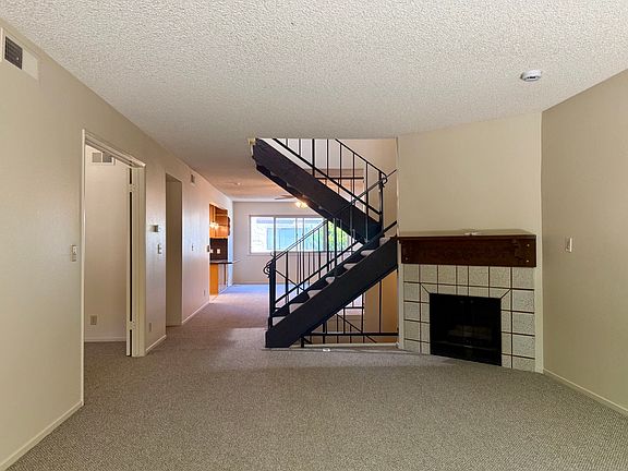 Spacious living room with fireplace