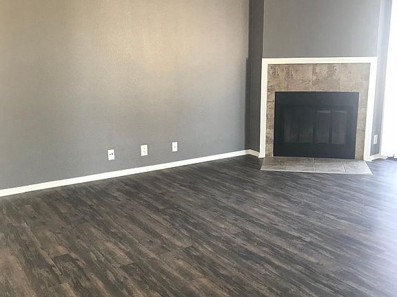 Living Room with Wood Burning Fireplace