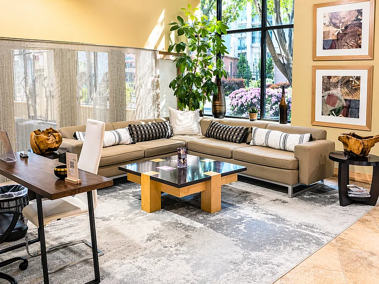 Inviting lobby lounge with comfortable sofa seating_perfect for relaxing or meeting guests.