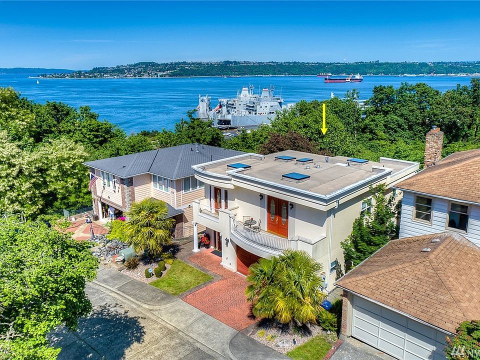 Poised in an elevated position in Old Town Tacoma, sits this luxurious Mediterranean style retreat.