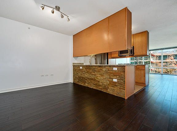 5th image of 9655 Woods Dr Unit 607
