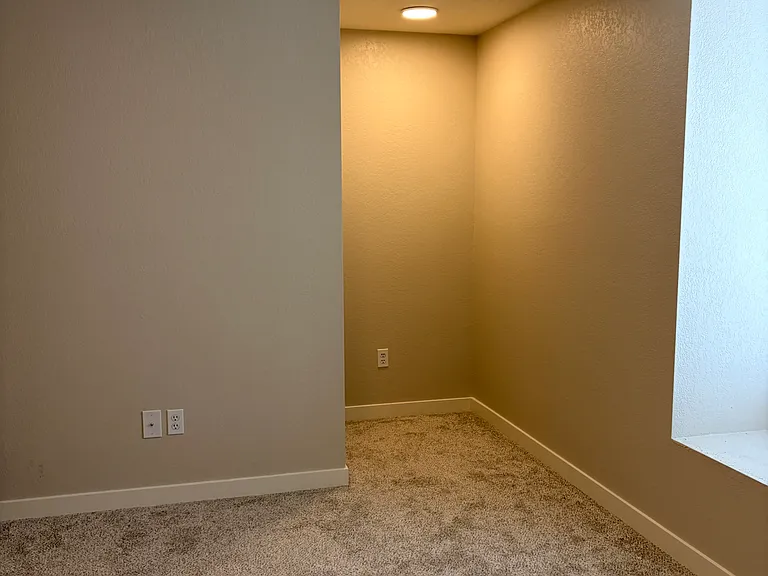 Large, deep nook with it's own light. Perfect for desk, dresser, rocking chair, a fort!