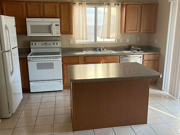 Kitchen with Island and Pantry.