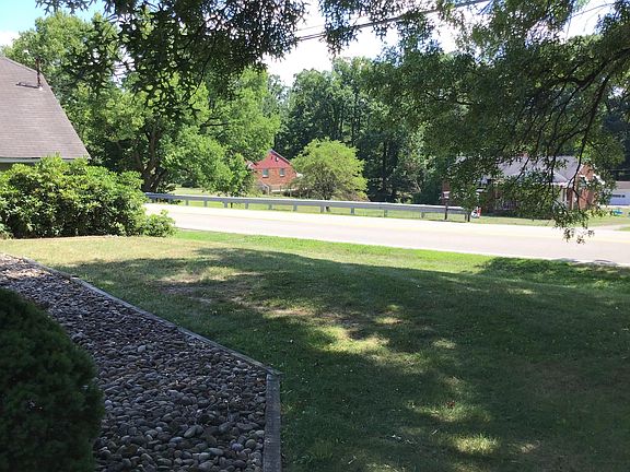 View of neighborhood from the front. This is part of the yard for the upstairs apartment (Apartment A).