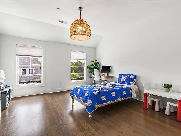Bright and airy bedroom with custom closets