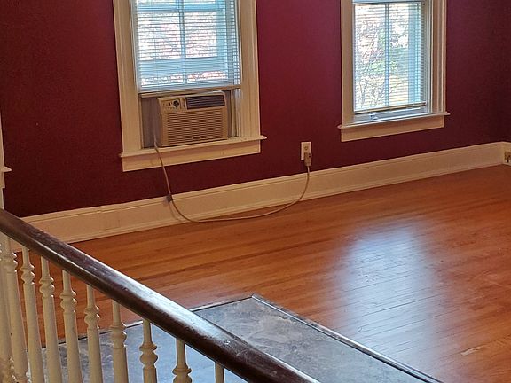 At the top of the stairs, look over left your shoulder to view the living room.