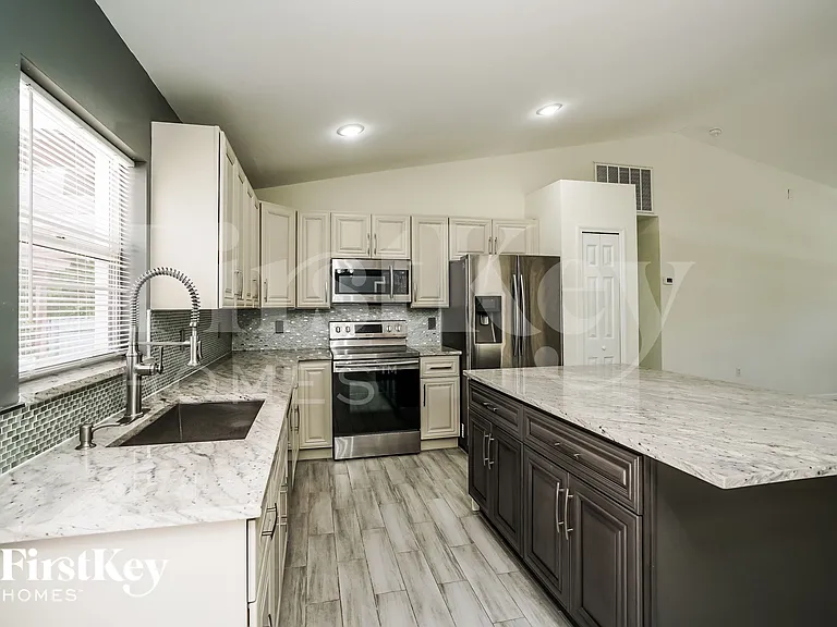 8451 Caloosa Rd — Photo 5