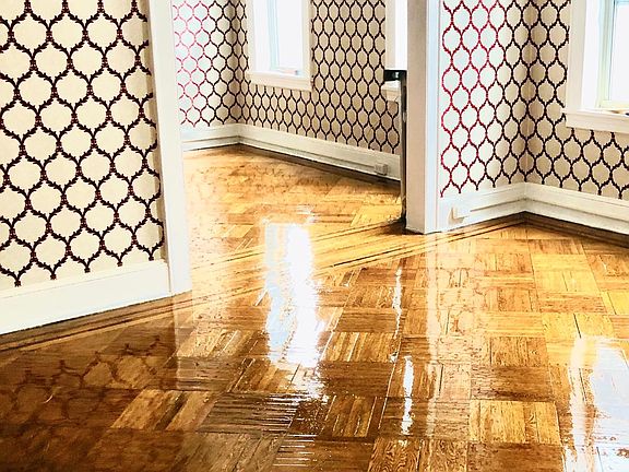 Dining Room with Refinished Wood Floors and New Blinds