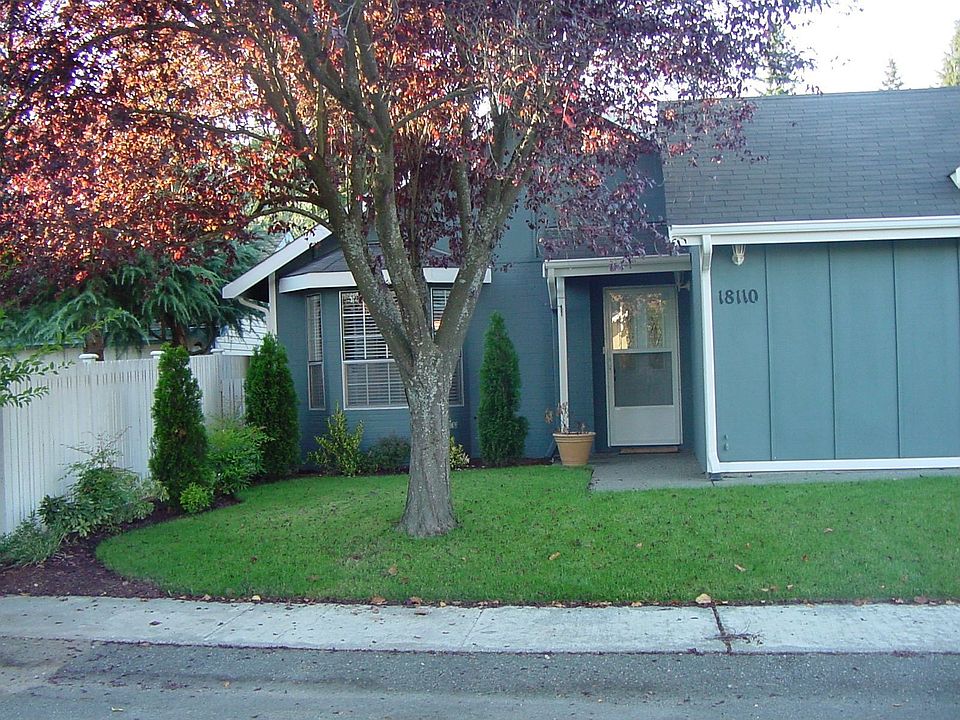 Front yard is low maintenance with mature landscaping