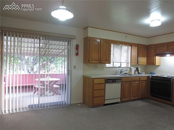 Kitchen walks out to covered deck!