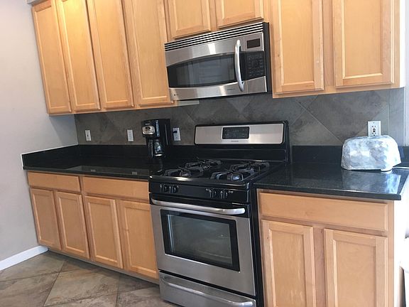Oak Cabinets and Stainless Appliances