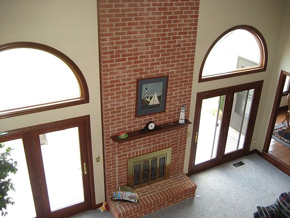 Great Room with two-story fireplace
