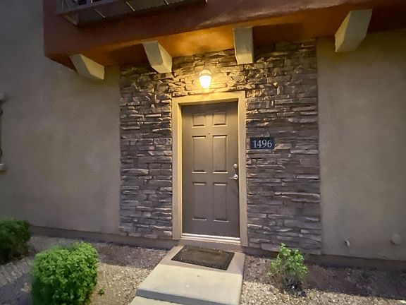 Main entrance well lit at night