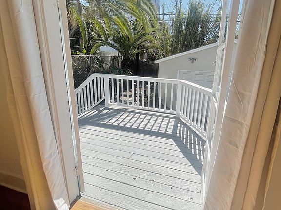 French doors from the living room onto the deck