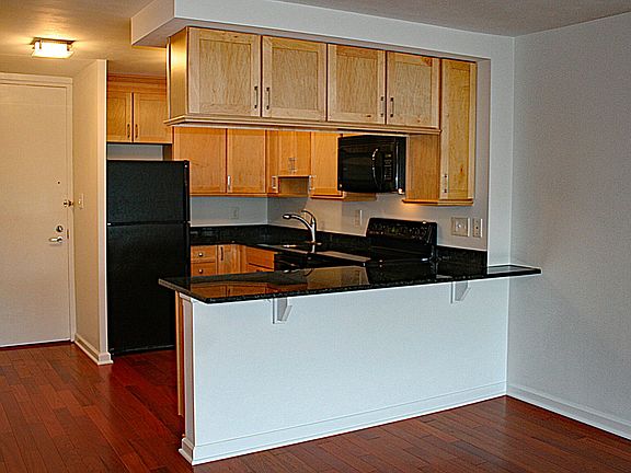Kitchen - with dishwasher, microwave and ample storage