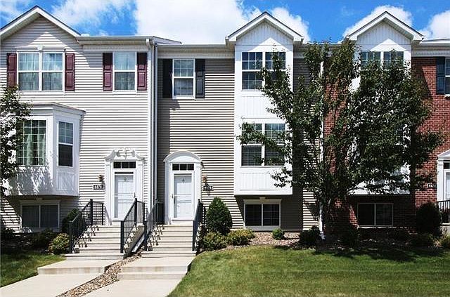 Front of townhome grey exterior (middle unit)