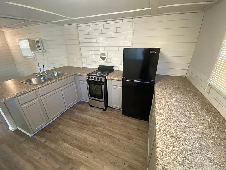 New oven and fridge included
