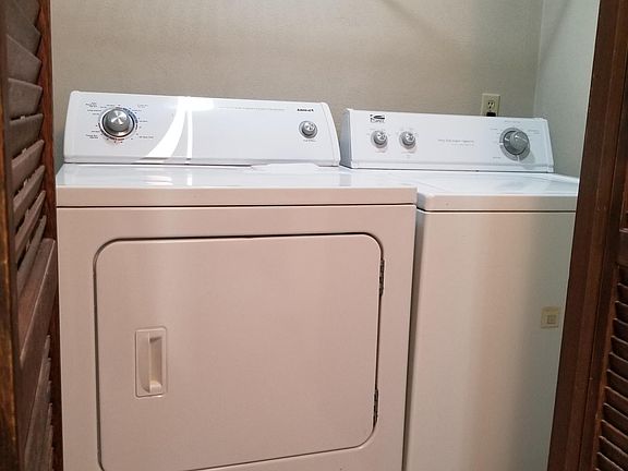 washer/dryer off kitchen