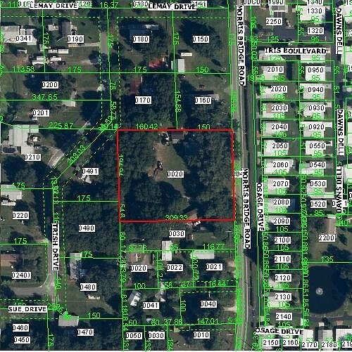 TWO ACRES-country living yet close to shopping & major highways.