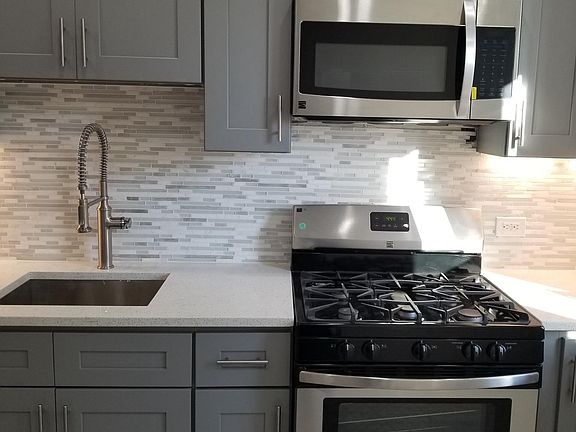Kitchen with new range and microwave