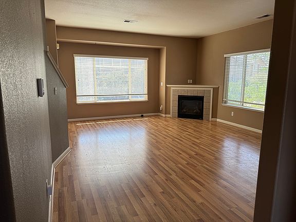 Large living room with gas fireplace.