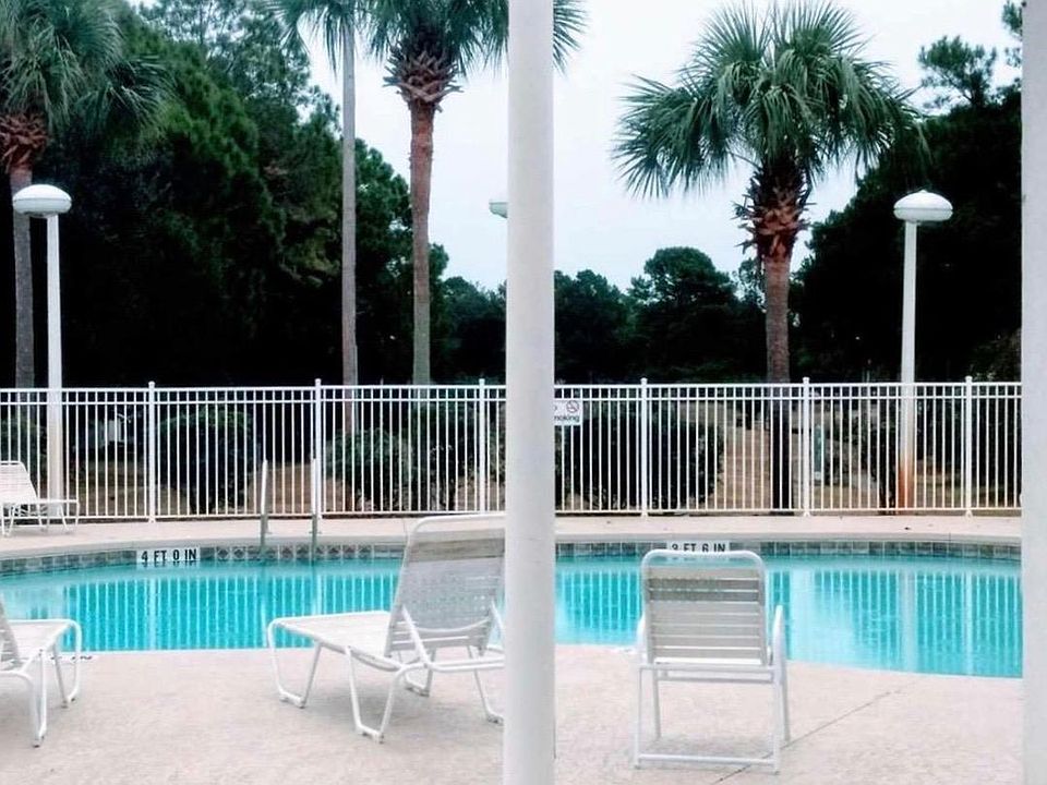 Community pool, steps away from rental unit