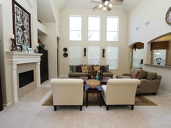 The family room has a double row of windows which keep this space light and bright.